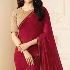 Maroon colored saree is made from art silk fabric which is highlighted with beautiful swarovski work as shown. comes along unstitched art silk (silk blend) blouse which you can customise as per your design/style. Occasion - You can wear this saree for festive and functions. Note:- The actual product may differ slightly in color and design from the one illustrated in the images when compared with computer or mobile screen. Red Tissue Silk Bollywood Blouse Piece, Red Bollywood Tissue Silk Blouse Piece, Elegant Semi-stitched Saree For Navratri, Unstitched Dola Silk Saree, Bollywood Style Dola Silk Saree, Bollywood Style Chanderi Blouse Piece, Bollywood Saree For Navratri, Semi-stitched Bollywood Blouse Piece In Tissue Silk, Chinon Saree Blouse For Eid