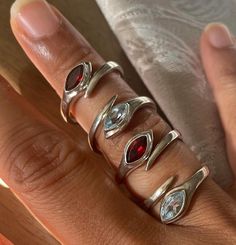 Delicate Adjustable Rings in 925 Sterling Silver - Garnet or Blue Topaz | Sizes Available  Product Detail: Product: Ring Metal: 925 Sterling Silver  Gemstone options: Garnet or Blue Topaz Ring wt: 4 gms. Approx #DelicateRings #AdjustableRings #GarnetRings #BlueTopazRings #925SterlingSilver #SilverJewelry #GemstoneRings #HandmadeJewelry #JewelryLover #BohoJewelry #VintageJewelry #FineJewelry #StatementRing #GiftForHer #JewelryAddict #UniqueJewelry #EtsySeller #HandcraftedJewelry #SilverRings #JewelryDesign #FashionJewelry #BohemianStyle #ElegantRings #EverydayJewelry #ClassicJewelry #JewelrySale #JewelryCollection #ArtisanJewelry #SterlingSilverRings #MinimalistJewelry #JewelryTrends Adjustable Sterling Silver Stackable Rings With Accent Stones, Adjustable Silver Birthstone Toe Ring, Silver Stackable Gemstones For Anniversary, Adjustable Silver Gemstone Ring, Adjustable Sterling Silver Topaz Ring With Accent Stones, Adjustable Sterling Silver Topaz Ring Gift, Adjustable Silver Stackable Rings With Stones, Adjustable Sterling Silver Topaz Birthstone Ring, Adjustable Silver Blue Topaz Jewelry