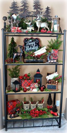 a shelf filled with lots of christmas decorations