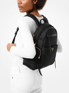 Our Prescott backpack is rendered in lightweight yet durable nylon gabardine making it ideal for daily use. Contrast leather trim and our updated logo charm add a luxe touch while exterior pockets and a front zipped compartment provide ample space for all the essentials. The padded straps and mesh back ensure comfort no matter how heavy your haul. Designer Travel Backpack With Zipper Pocket, Luxury Nylon Backpack With Zipper Closure, Designer Nylon Backpack For Travel, Designer Nylon Backpack For Everyday, Travel Backpack With Leather Trim And Nylon Material, Luxury Nylon Backpack With Leather Trim, Tumi Backpack, Beautiful Backpacks, Day Backpacks