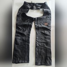 Good Condition. Normal Signs Of Age And Use. Missing Button Snap And Zipper Tab On The Left Bottom Part Of Chaps. Please Review All The Photos. Size: Small Approximate Lay Flat Measurements: Length: 37.5" Inseam: 27.5" Fabric: Genuine Leather Leather Chaps, Harley Davidson Vintage, Lay Flat, Harley Davidson, Pant Jumpsuit, Vintage Ladies, Outfit Inspirations, Genuine Leather, Black Leather