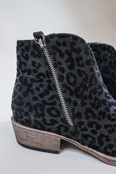 Introducing the Charming Black Leopard Bootie - a wild and stylish addition to your shoe collection! With its fierce leopard print and charming cutout design, this bootie is sure to make a statement. Comfort and fashion join forces in this must-have footwear. Rawr! Trendy Leopard Print Leather Boots, Trendy Leopard Print Boots For Fall, Leopard Print Leather Boots For Spring, Spring Leopard Print Leather Boots, Leopard Print Round Toe Boots For Spring, Spring Leopard Print Round Toe Boots, Casual Leopard Print Boots For Fall, Cutout Design, Black Leopard