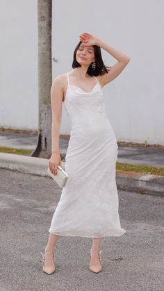 Indulge in the epitome of elegance with this delicate cowl neck midi dress adorned with a mesmerizing floral white design. Effortlessly chic, the cowl neckline drapes gracefully, while the midi length exudes sophistication. Features: Midi Cowl Neck Floral White Fabric Model is wearing a small 78956 Elegant Spring Dress With Cowl Neck, Elegant Cowl Neck Dress For Date Night, Elegant Cowl Neck Midi Dress For Date Night, Elegant Cowl Neck Midi Dress For Summer, Elegant Midi Dress With Cowl Neck For Formal Occasions, Elegant Midi Dress With Cowl Neck, Spring Formal Maxi Dress With Cowl Neck, Cowl Neck Midi Dress, Cowl Neckline