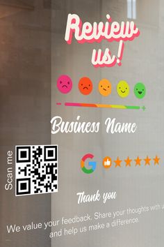 an advertisement for a business name on a glass door with emotication stickers