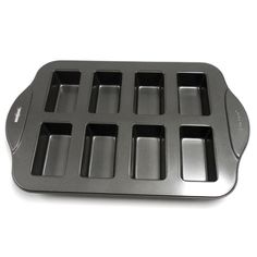 an aluminum tray with six compartments on it