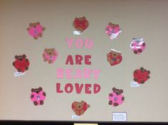 a bulletin board with teddy bears and hearts on it that says you are beary loved