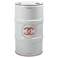 a white canister with the word chanel on it