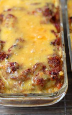 two casserole dishes filled with cheese and meat