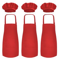 four red aprons with three hats on top and one in the middle, all facing different directions