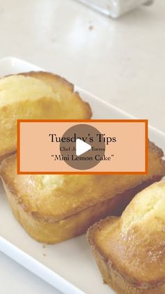 three muffins on a white plate with an orange border around the edges that says tuxedo's tips