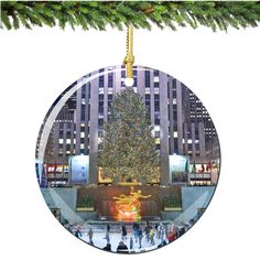 a large christmas tree in the middle of a city