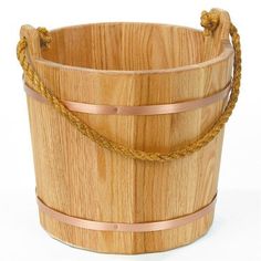 a wooden bucket with rope around it