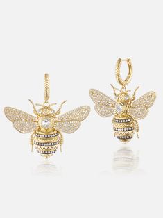 18k yellow gold honey bee drop huggie earrings featuring a diamond hex, diamond details and gray sapphire eyes. A captivating combination of whimsy and signature Harwell Godfrey patterns, our one of a kind drop earrings are business on the top and party on the bottom. The Menagerie is a spectacular capsule of one-of-a-kind, limited edition and highly detailed animal jewels. Each divine creature — whether traveling by air, earth or sea — was specifically chosen by designer Lauren Harwell Godfrey Harwell Godfrey, Gray Sapphire, Bumble Bee Jewelry, Honey Bee Earrings, Grey Sapphire, Sapphire Eyes, Bee Jewelry, Fine Diamond Jewelry, Gold Bee