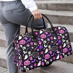 My hand drawn and original character illustrations make this spooky gothic Halloween patterned Faux Leather travel bag the perfect spooky season accessory. Features my hand drawn illustrations of skulls, black cats, tombstones, moons, bats, ghosts, bones, Halloween candy,  and more. The perfect travel bag for your spooky season travels or for every day use. Shop all of my travel bags at the link below: https://www.etsy.com/shop/darlingghoul?ref=seller-platform-mcnav&section_id=26920607 --------- Black School Bag For Halloween, Purple School Bag For Halloween, Black Rectangular Bag For Halloween, Rectangular Black Bag For Halloween, Spooky Black Bags For Halloween, Spooky Black Halloween Bags, Black Large Capacity Bags For Halloween, Large Capacity Black Bag For Halloween, Gothic Travel Bag For Halloween