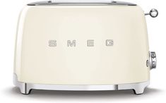 smeg toaster with the word smeg on it's front and side