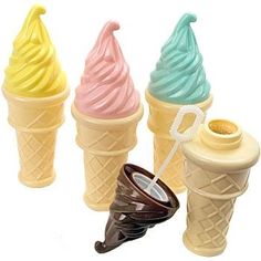 four ice cream cones with different flavors in them