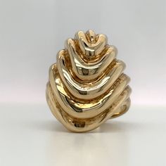 This is an epic 1970s era Disco Ring! The design reminds me of liquid magma. This ring is a large beautiful statement ring and also perfect for everyday wear. It looks great paired with other rings on the same hand. Crafted in 14K YG weight is: 14.70 grams. 6.5 size (sizable upon request) ***With any pre-owned/Vintage/Antique items, it is common to have some wear, As we inspect each piece of our jewelry, we make sure the wear and tear is acceptable within industry standards*** FOLLOW US TO SEE M Unique Yellow Gold Dome Ring With Polished Finish, Knuckle Rings, Chunky Rings, Liquid Gold, Antique Items, Statement Ring, Rings Statement, Vintage Rings, Statement Rings