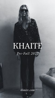 a black and white photo of a woman in sunglasses standing next to a wall with the words khatte pro - fall 2012 on it