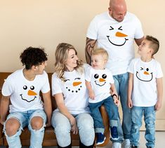 These super soft and super comfy Funny Christmas Family matching shirts with snowman faces are the perfect Christmas party outfit! These could be you favorite ones for your Christmas family reunion group shirts. Wear them as Holiday Apparel or fill your Christmas basket gift - that's awesome idea! THIS LISTING IS FOR ONE SHIRT. TO MAKE A SET, PLEASE ADD THE SHIRTS YOU WANT TO YOUR CART. Our t-shirts and bodysuits are SUPER soft and SUPER comfy.  Mama Shirts Sizing is UNISEX and will be a relaxed fit with longer length for women, and fitted chest and bicep for men. Ladies, we recommend ordering your normal size for a relaxed fit, but sizing down if between sizes or prefer a more fitted look.  These are unisex sized, so the fit will be looser if you order your normal women's size. We recomme Holiday Shirt Family, Family Reunion Christmas, Group Vacation Shirts, Holiday Shirt Ideas, Group Vacation, Family Christmas Outfits, Funny Snowman, Snowman Shirt, Family Matching Shirts