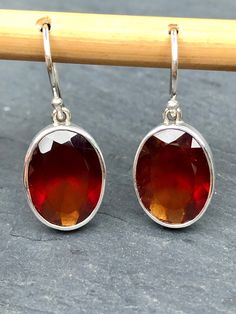 Garnet Earrings Faceted Oval,Hessonite Large Blood Red Garnet Natural,Top Quality Jewelry,Bright Fire Red Gemstone Earrings Sterling Silver Garnet Earrings Faceted Oval Shape, these Hessonite Large Blood Red Garnet Natural Gems is Top Quality Jewelry and Bright Fire Red Gemstone Earrings Sterling Silver 925. This is beautiful red Garnet at its finest. These Faceted Hessonite Garnets literally glow and flash fiery red, and are 100% Natural Garnet.  This most gorgeous and rare Hessonite Garnet Ear Hessonite Garnet, Red Gemstones, Garnet Earrings, Blood Red, Red Fire, Red Garnet, Earrings Sterling Silver, Sterling Earrings, Quality Jewelry