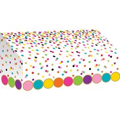 a white box with multicolored polka dots on it