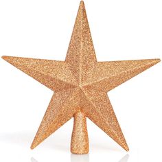 a gold glitter star decoration on a white background