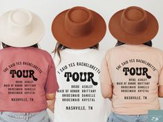 three girls wearing matching tshirts and hats with the words tour written on them