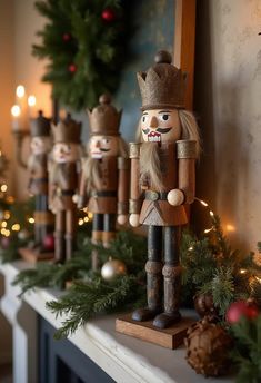 nutcracker figurines lined up on a mantel