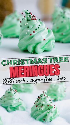 green frosted christmas tree meringues on a white plate