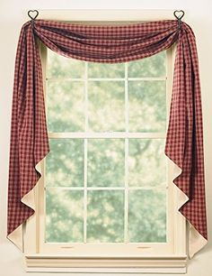 a red and white checkered curtain hanging in front of a window