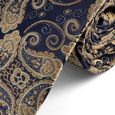 Every man should own a paisley tie. Our soft polyester neckwear features a detailed paisley pattern in creamy blue and gold. Wear it with your best suit or a more casual outfit for a uniquely stylish look. Semi-narrow model. Gold Paisley, Art Of Manliness, Shark Fishing, Paisley Tie, Big Guys, Navy Blue Background, Blue Paisley, Gentleman Style, Pusheen