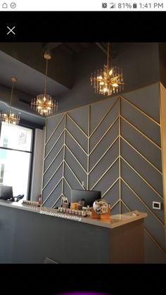 the interior of a restaurant with chandeliers hanging from the ceiling and on the wall