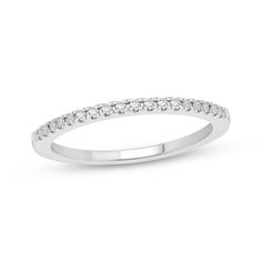 a white gold wedding band with diamonds