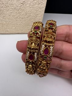 Traditional Bangles comes as a pairColor : Matte Size : Size : 2.4Stones : AD Red Green Stone Luxury Multicolor Jewelry For Puja, Luxury Meenakari Bangle For Diwali, Multi Color Bangles, Antique Necklace Victorian, Traditional Bangles, Real Pearl Necklace, Matte Size, Ethnic Necklaces, Traditional Earrings