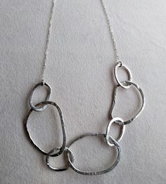 This is a unique design for this necklace made with hammered sterling silver 925 and sterling silver chain. This is a core piece in my hammered sterling silver collection of jewelry... The large circles necklace exists in sterling silver with or without gemstones. Each necklace is uniquely handmade. This necklace symbolizes the strong woman in us, united to other women by strong yet flexible links: her sisters are her strength, the ties that give her permission to take flight without the fear of Life Is But A Dream, Circle Jewelry, Silver Collection, Hammered Sterling Silver, Aquamarine Stone, Circle Necklace, Bead Leather, Gems Jewelry, Necklace Sterling Silver