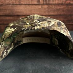 Vintage Style Cowboy Hat Embroidered Camouflage Canvas Snapback Trucker Rope Hat with Free Shipping. White stitched text/logo. Condition is "New with tags". Shipped with USPS First Class. *Condition is "New with tags". Shipped with USPS First Class. *This is a medium profile hat that will fit most medium to large sized heads  *Please feel free to message us questions about the fit; we don't mind!  *Each listing includes 1 vintage style mesh back trucker hat with an embroidered design.   If this hat/design isn't your style, then check out the others currently in our Etsy store! If you still can't find a hat, please feel free to send us a message!  Each hat is hand made to order and expect your order to be processed within 1-3 business days of purchase. Our business days are Monday-Saturday. Camouflage Baseball Cap With Visor, Outdoor Camouflage Snapback Baseball Cap, Camouflage Snapback Baseball Cap For Outdoor, Camouflage Snapback Baseball Cap For Outdoor Activities, Camouflage Trucker Baseball Cap With Flat Bill, Military Style Camouflage Snapback With Curved Brim, Military Camouflage Snapback Hat With Curved Brim, Military Camouflage Trucker Hat With Curved Bill, Camouflage Snapback Hat For Outdoor