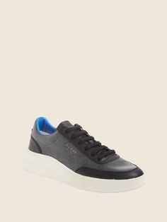 Effortless for any look, these faux-leather sneakers are designed in a low-top silhouette with logo detailing and lace-up closure. Casual Lace-up Sneakers With Logo, Casual Lace-up High-top Sneakers With Logo, Low-top Logo Sneakers In Athleisure Style, Casual Leather Sneakers With Logo, Casual Lace-up High-top Sneakers With Embossed Logo, Casual Lace-up Logo Sneakers, Low-top Logo Sneakers For Athleisure, Modern Synthetic Sneakers With Logo Print, Casual High-top Sneakers With Embossed Logo