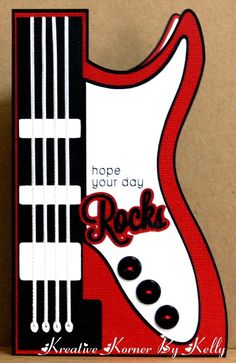 a red and black guitar shaped card with the words hope your day rock