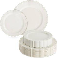 white dinner plates stacked on top of each other