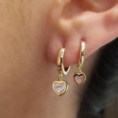 Medium Mother Pearl Heart Huggie Earrings by Kury - Available at SHOPKURY.COM. Free Shipping on orders over $200. Trusted jewelers since 1965, from San Juan, Puerto Rico. Dainty 14k Gold Earrings With Charms, Elegant Huggie Earrings For Valentine's Day, Fine Jewelry Dangle Heart Charm, Fine Jewelry Dangle Earrings With Heart Charm, Fine Jewelry With Heart Charm Dangle, Huggie Jewelry With Heart Charm For Anniversary, Heart Charm Huggie Jewelry For Anniversary, Elegant Huggie Earrings With Heart Charm, Fine Jewelry Heart Pendant Earrings For Valentine's Day