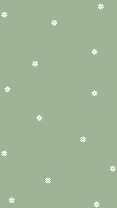 a green background with white snowflakes on it