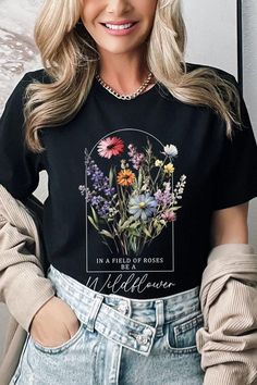 Field of Roses Be A Wildflower Floral Meadow Graphic T Shirts.Unisex Crew Neck Short Sleeve Tees.Crafted from premium materials, tailored to your lifestyle, ensuring a comfortable fit for any occasion.Family Group Uniforms Birthday Party Gift Concert Festival Events.High Quality Direct To Film Printed Graphic Design.100%COTTON,HEATHER(52%COTTON,48%POLY),ATH.HEATHER,BLACK HEATHER(90%COTTON,10%POLY)NICARAGUAMade In: Nicaragua Film Prints, Birthday Party Gift, Graphic Design Print, Party Gifts, Graphic Prints, Wild Flowers, Graphic Tshirt, Comfort Fit, Graphic Tees