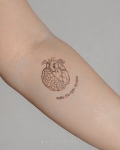 a person with a tattoo on their arm