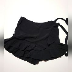 Questions? Leave A Comment Below. Casual Party Shorts With Ruffles, Ruffled Mini Skort For Night Out, Trendy Ruffled Shorts For Party, Black Flirty Skirt With Ruffle Hem, Trendy Black Mini Skirt With Ruffles, Trendy Black Ruffled Skort, Trendy Ruffled Party Shorts, Black Ruffled Skirt For Date Night, Black Short Mini Skirt For Summer