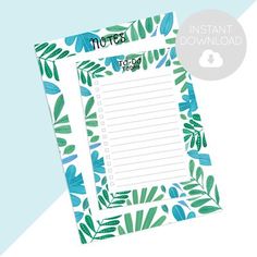 a blue and green leaf lined notepad with the words notes on it