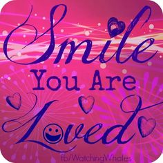 the words smile you are loved on a pink background