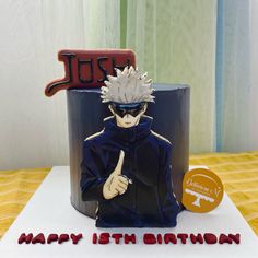 a birthday cake with an anime character on it