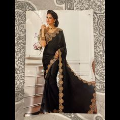 Please View Pictures Carefully As This Is Part Of The Description And Condition....Before Purchasing:) I Value My 100% Feedback Rating So Any Questions Or Concerns Please Message Me. Please Be Mindful Of Color Distortions Caused By Variations With Cameras, Editing Features, Lighting, Monitors & Screens. Black Satin Chiffon Saree Shows Fancy Embroidered Decorative Patterns Framing Its Simplistic Range. Comes With Matching Blouse.Fabric : Satin Chiffoncustom Tailoring Options :Comes With Unstitche Luxury Lace Bollywood Saree, Saree Images, Bollywood Designer Sarees, Latest Indian Saree, Designer Silk Sarees, Wedding Saree Indian, Black Saree, Art Silk Sarees, Stylish Sarees