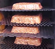 some food is cooking in an oven on the rack and it's ready to be cooked