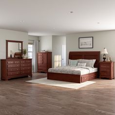 a bedroom scene with focus on the bed and dresser